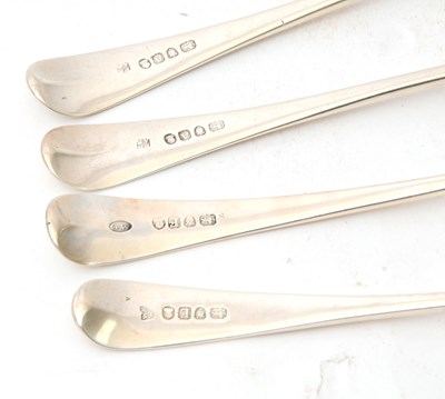 Lot 37 - A group of four Georgian silver serving spoons...