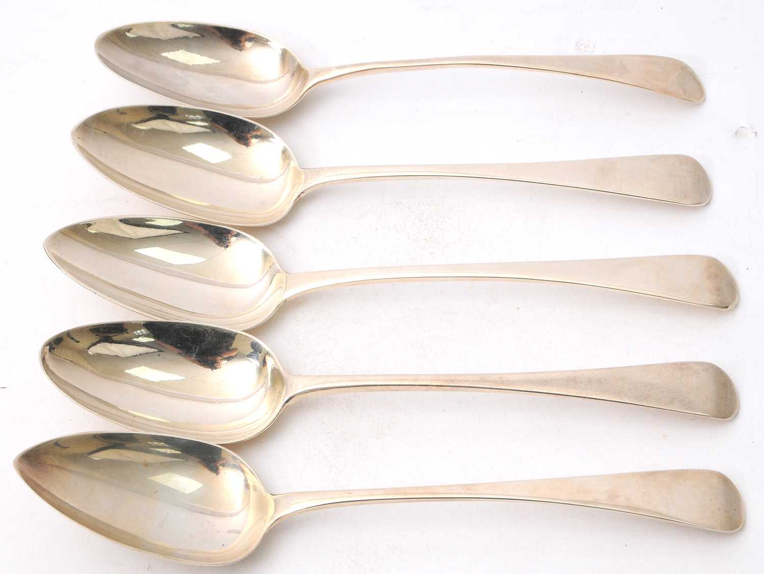 Lot 39 - A group of five Georgian silver serving spoons...