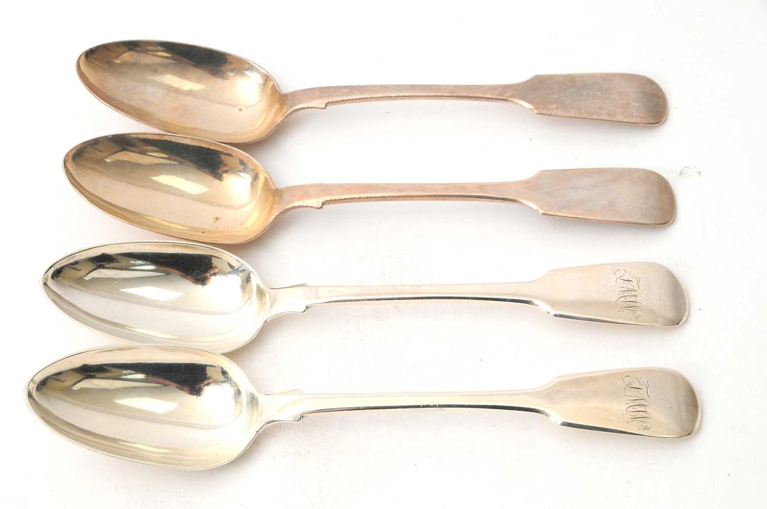 Lot 45 - A group of four silver fiddle pattern serving...