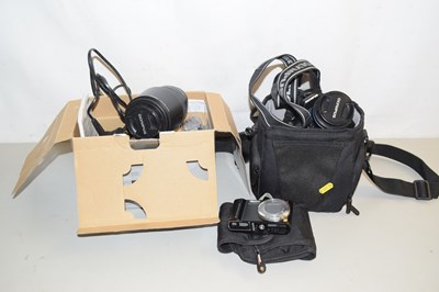 Lot 7 - An OIympus E-410 digital camera together with...