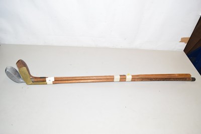 Lot 45 - A group of three vintage golf clubs