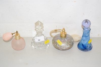 Lot 52 - A group of three perfume bottles