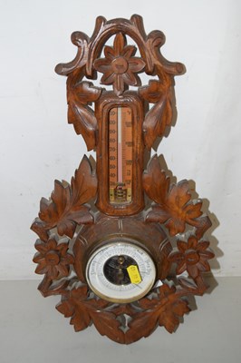 Lot 61 - A late 19th Century barometer in carved frame