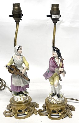 Lot 275 - Pair of Continental Porcelain Figures after Meissen Mounted as Lamps