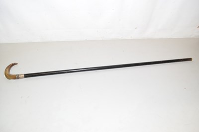 Lot 84 - A walking stick with silver and horn handle
