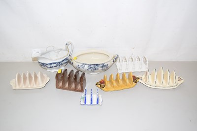 Lot 151 - A collection of various pottery toast racks...