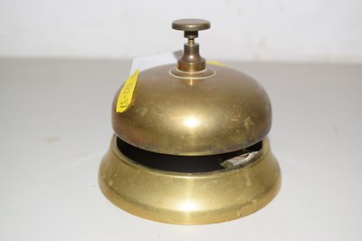Lot 114 - A counter top brass bell