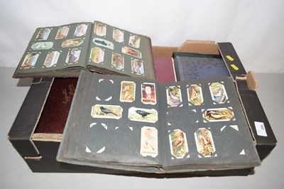Lot 206 - Box of albums of cigarette cards