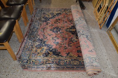 Lot 244 - A 20th Century machine made wool floor rug