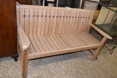 Lot 307 - An as new teak garden bench