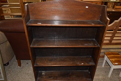 Lot 313 - An oak open front bookcase cabinet