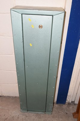 Lot 325 - A gun cabinet