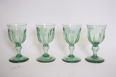 Lot 48 - Set of four green glass 19th century wine...