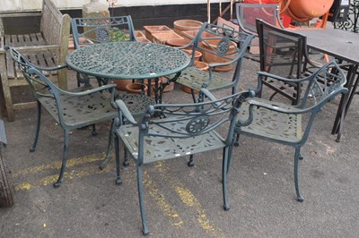 Lot 332 - A circular metal garden table with pierced...