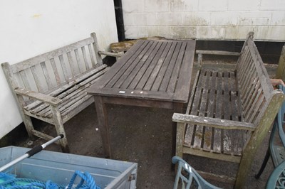 Lot 334 - A hardwood garden table and two benches