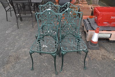 Lot 341 - A set of four cast aluminium garden chairs