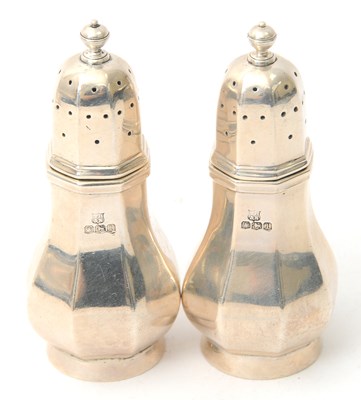Lot 60 - A pair of  George V silver casters of...