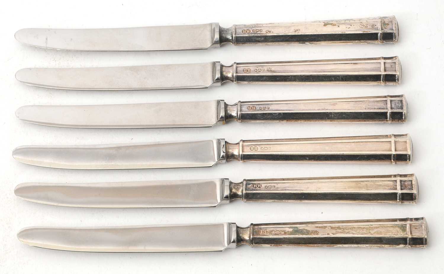 Lot 67 - A set of six silver handled tea knives,...