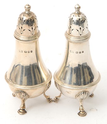 Lot 69 - A pair of George VI silver sifters of plain...
