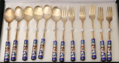 Lot 89 - A Korean twelve piece spoon/fork set, each...
