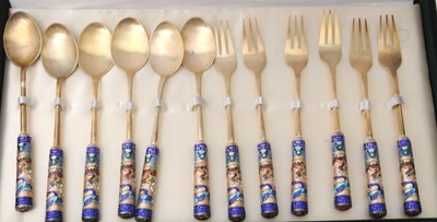Lot 89 - A Korean twelve piece spoon/fork set, each...