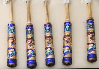 Lot 89 - A Korean twelve piece spoon/fork set, each...