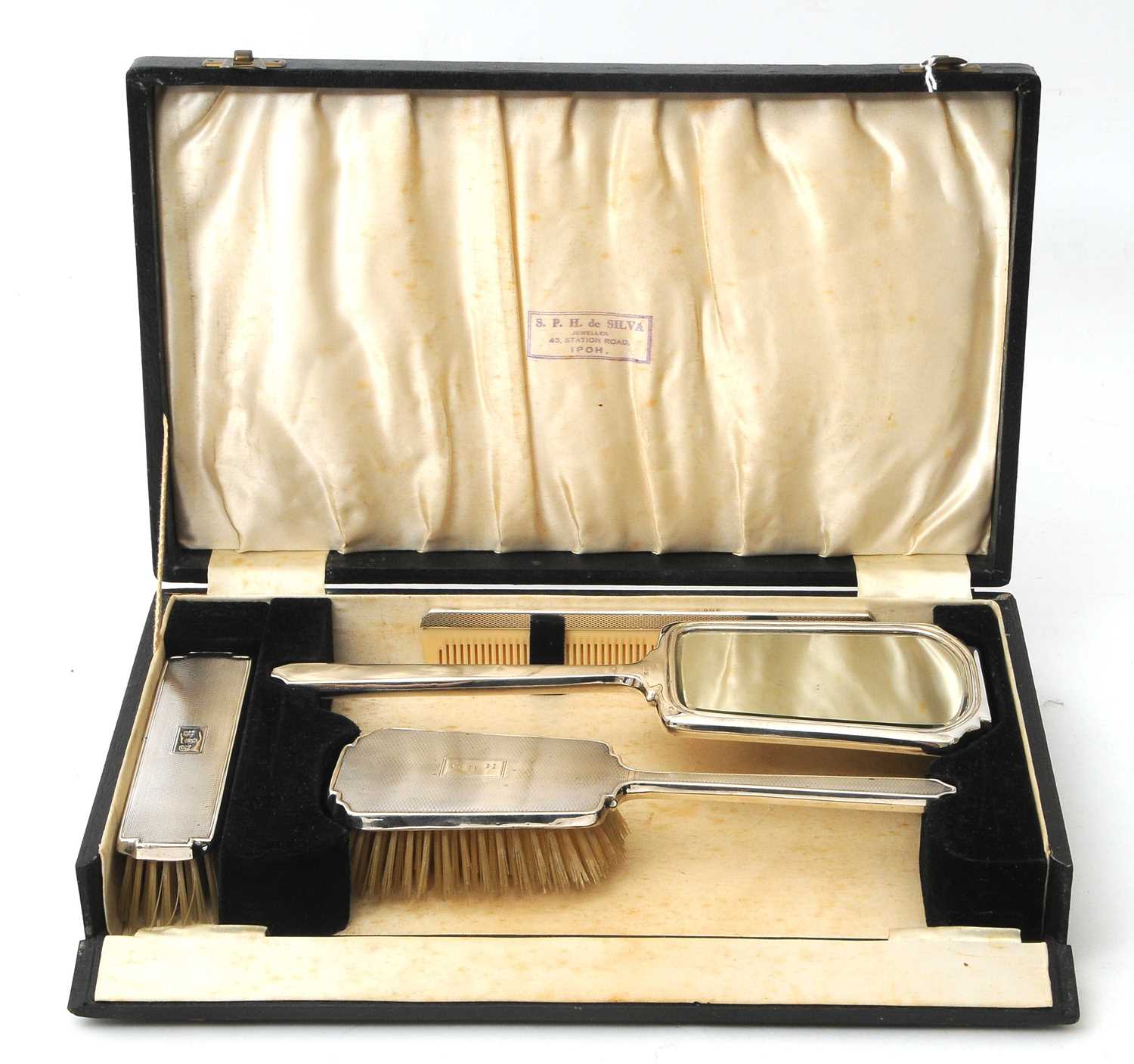 Lot 92 - A cased George VI silver mounted dressing...