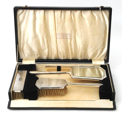 Lot 92 - A cased George VI silver mounted dressing...