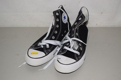 Lot 504 - A pair of as new Converse trainers, size 7