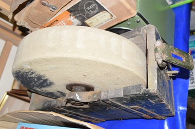 Lot 512 - A stone grinding wheel in wooden case
