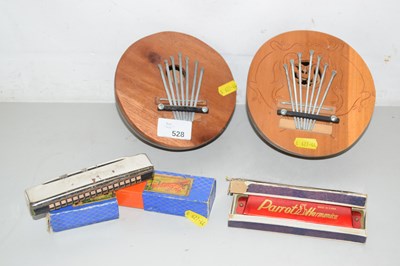 Lot 528 - Two African Kalimba thumb pianos together with...