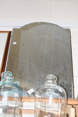 Lot 564 - A wall mirror