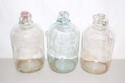 Lot 565 - Three glass demi-johns