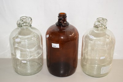 Lot 573 - Three glass demi-johns