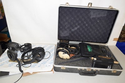 Lot 620 - A cased Fisher metal detector together with...