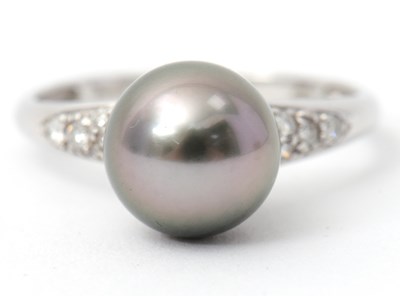 Lot 5 - A 9ct pearl and diamond ring, the Tahitian...