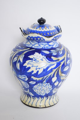 Lot 87 - Deco vase and cover, the blue ground with...
