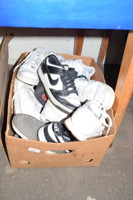 Lot 709 - One box of assorted trainers to include Reebok...