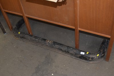 Lot 816 - An iron fire curb