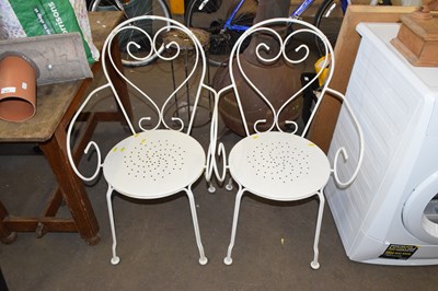Lot 824 - Pair of iron framed garden chairs