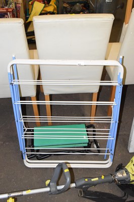 Lot 833 - A garden kneeler and a laundry airer