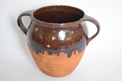 Lot 99 - Pottery bowl with streaked brown glaze, 23cm high