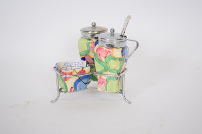 Lot 108 - Clarice Cliff condiment set comprising mustard...