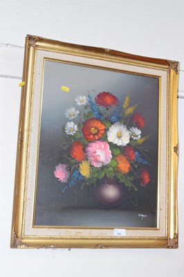 Lot 762 - A modern oil on canvas still life of flowers