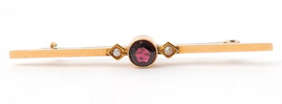 Lot 45 - A garnet and seed pearl bar brooch, with...