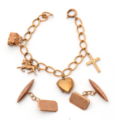 Lot 114 - A charm bracelet and cufflinks: the unmarked...