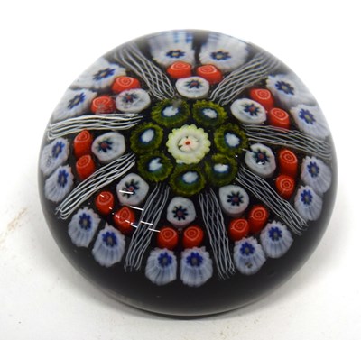Lot 134 - Paperweight with a series of multi-coloured...