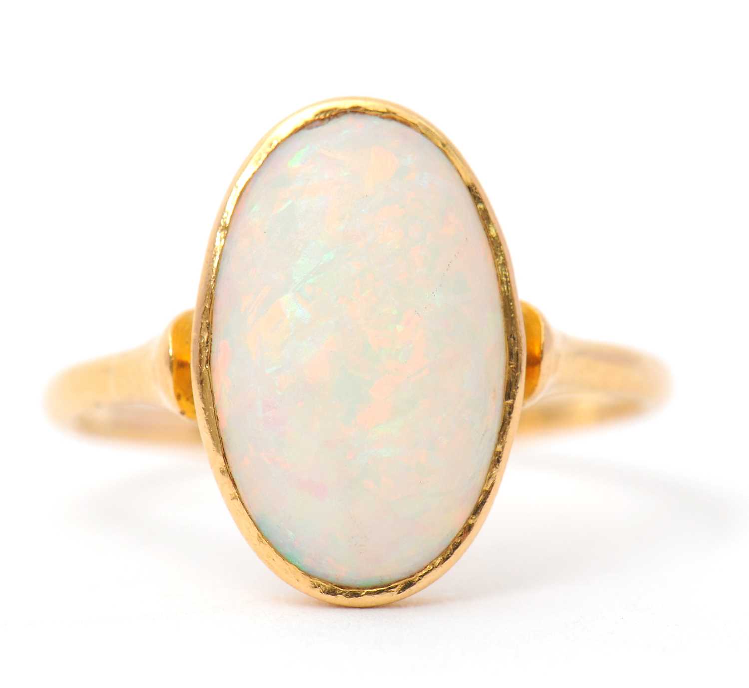 Lot 28 - An opal ring, with single oval opal cabochon,...