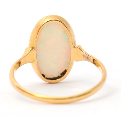 Lot 28 - An opal ring, with single oval opal cabochon,...