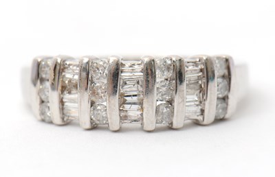 Lot 30 - A 9ct diamond ring, set with round brilliant...